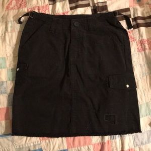 Black distressed cotton mini skirt